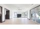 Spacious living room featuring recessed lights, fireplace, and large windows at 750 Garden Reserve Ln, Alpharetta, GA 30005