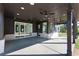 Spacious covered patio featuring ceiling fans and recessed lighting, perfect for outdoor entertaining at 750 Garden Reserve Ln, Alpharetta, GA 30005