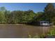 Pond featuring a gazebo providing a tranquil view for the residence at 750 Garden Reserve Ln, Alpharetta, GA 30005