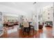Open floor plan showcasing the living room and dining area at 140 Lost Forest Dr, Mcdonough, GA 30252