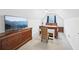 Bright bedroom featuring a bed, study desk and tv with modern design, and cozy carpet at 4185 Cami Way, Buford, GA 30519