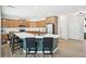 Beautiful kitchen with stainless steel appliances, an island with seating and updated countertops at 4185 Cami Way, Buford, GA 30519