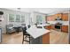 Modern kitchen with quartz countertops, stainless steel appliances, ample cabinet space, and adjacent breakfast nook at 4185 Cami Way, Buford, GA 30519