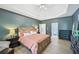 Spacious main bedroom with trey ceilings, hardwood floors, and plenty of natural light at 4185 Cami Way, Buford, GA 30519