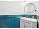 Stylish half bathroom with decorative walls, updated vanity, and modern fixtures at 4185 Cami Way, Buford, GA 30519