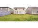 Great backyard with ample space, a patio, and a view of the property's exterior at 7747 Rudder Cir, Fairburn, GA 30213