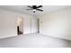 Spacious bedroom with a ceiling fan and plenty of natural light at 7747 Rudder Cir, Fairburn, GA 30213