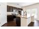 Well-appointed kitchen featuring granite countertops, stainless steel appliances, and ample cabinet space at 7747 Rudder Cir, Fairburn, GA 30213