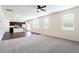 Open-concept living space with a seamless transition to the kitchen and dining area at 7747 Rudder Cir, Fairburn, GA 30213
