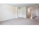 Large open loft with neutral carpet, ideal for a playroom or second living space at 7747 Rudder Cir, Fairburn, GA 30213