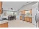 Bright eat-in kitchen boasts stainless steel appliances and a charming dining area at 20 Madison Ct, Covington, GA 30016