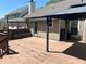 Spacious back deck with a gazebo, bench seating, and a retractable awning for shade and privacy at 2435 Jakin Way, Suwanee, GA 30024