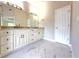 Bathroom featuring a double sink vanity, granite countertops, and tile floor at 3500 Millwater Xing, Dacula, GA 30019