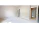 Neutral bedroom with plush carpeting and doors to other rooms at 3500 Millwater Xing, Dacula, GA 30019