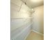 A well-organized walk-in closet featuring wire shelving for optimal storage and organization at 3500 Millwater Xing, Dacula, GA 30019