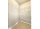 An organized walk-in closet with wire shelving offering ample storage space at 3500 Millwater Xing, Dacula, GA 30019