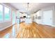 Modern kitchen with white cabinets, stainless steel appliances, and a center island at 3500 Millwater Xing, Dacula, GA 30019