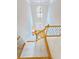 Grand staircase with hardwood and carpet leading to a bright entryway at 3500 Millwater Xing, Dacula, GA 30019