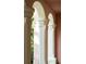 Close-up of the stately white arches, highlighting the architectural details and lush green surroundings at 4705 Paran Nw Vly, Atlanta, GA 30327