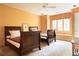 Spacious bedroom featuring matching twin beds and a cozy window seat at 4705 Paran Nw Vly, Atlanta, GA 30327