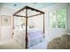 Bedroom features a four-poster bed, and plenty of natural light at 4705 Paran Nw Vly, Atlanta, GA 30327