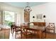 Elegant dining room with chandelier, French doors to patio, and classic furnishings, perfect for entertaining at 4705 Paran Nw Vly, Atlanta, GA 30327
