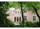 Exterior elevation of the home with manicured landscaping at 4705 Paran Nw Vly, Atlanta, GA 30327
