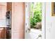 Open kitchen view to backyard, stainless steel appliances, and wooden cabinets at 4705 Paran Nw Vly, Atlanta, GA 30327