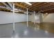 Spacious unfinished basement with concrete floor, white walls, and exposed ductwork at 1987 Darrell Dr, Marietta, GA 30066
