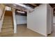 Spacious basement with stairs leading down, ready for customization at 1987 Darrell Dr, Marietta, GA 30066