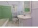 Cozy bathroom featuring a tub, vanity, and window for natural light at 1987 Darrell Dr, Marietta, GA 30066