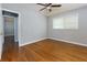 Bedroom with hardwood flooring, large window providing natural light, and a neutral color palette at 1987 Darrell Dr, Marietta, GA 30066