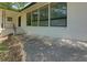 A covered porch provides shade and protection at the main entry to this home at 1987 Darrell Dr, Marietta, GA 30066