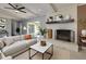 Stylishly staged living room features a fireplace, comfortable seating, and contemporary decor at 1987 Darrell Dr, Marietta, GA 30066