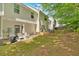 Spacious backyard featuring a patio with outdoor seating, perfect for entertaining and relaxing at 261 Venture Path, Hiram, GA 30141