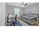 Comfortable bedroom features a modern desk, neutral walls, and cozy bed at 261 Venture Path, Hiram, GA 30141