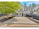 Charming townhome featuring ample parking and well-manicured landscaping at 261 Venture Path, Hiram, GA 30141