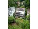 Aerial view of the home showcasing the lush backyard and surrounding trees at 331 Gordon Ne Ave, Atlanta, GA 30307