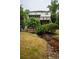 Spacious backyard with lush greenery, bridge and direct access to the house at 331 Gordon Ne Ave, Atlanta, GA 30307