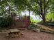 Relaxing backyard deck with scenic views, picnic table, and stone landscaping at 331 Gordon Ne Ave, Atlanta, GA 30307