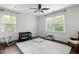 Spacious bedroom with two large windows and plenty of room for play, creating a versatile and airy atmosphere at 331 Gordon Ne Ave, Atlanta, GA 30307