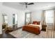 Well-lit bedroom with hardwood floors, ceiling fan, and large windows at 331 Gordon Ne Ave, Atlanta, GA 30307