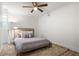 A cozy bedroom with a ceiling fan, neutral walls, and a comfortable queen-sized bed at 331 Gordon Ne Ave, Atlanta, GA 30307