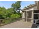 Spacious outdoor deck offers views of lush greenery and a screened in patio space at 331 Gordon Ne Ave, Atlanta, GA 30307