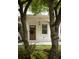 Close-up of the home's entrance showcasing the front door, number, and landscaping at 331 Gordon Ne Ave, Atlanta, GA 30307