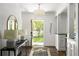 Bright foyer with hardwood floors, chandelier, and a view to the backyard at 331 Gordon Ne Ave, Atlanta, GA 30307
