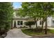 Front exterior featuring a well-manicured lawn and mature landscaping at 331 Gordon Ne Ave, Atlanta, GA 30307