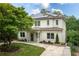 Charming two-story home with a well-manicured lawn and beautiful landscaping at 331 Gordon Ne Ave, Atlanta, GA 30307