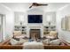 Cozy living room with fireplace, built-in shelves, and comfortable seating at 331 Gordon Ne Ave, Atlanta, GA 30307