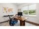 Well-lit home office with large window, desk, and modern decor at 331 Gordon Ne Ave, Atlanta, GA 30307